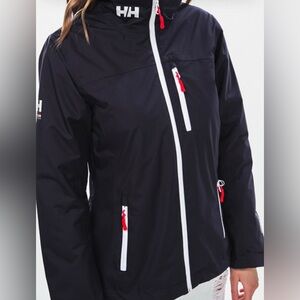 Helly Hansen Black Ski Jacket with White Zippers and Red Pulls